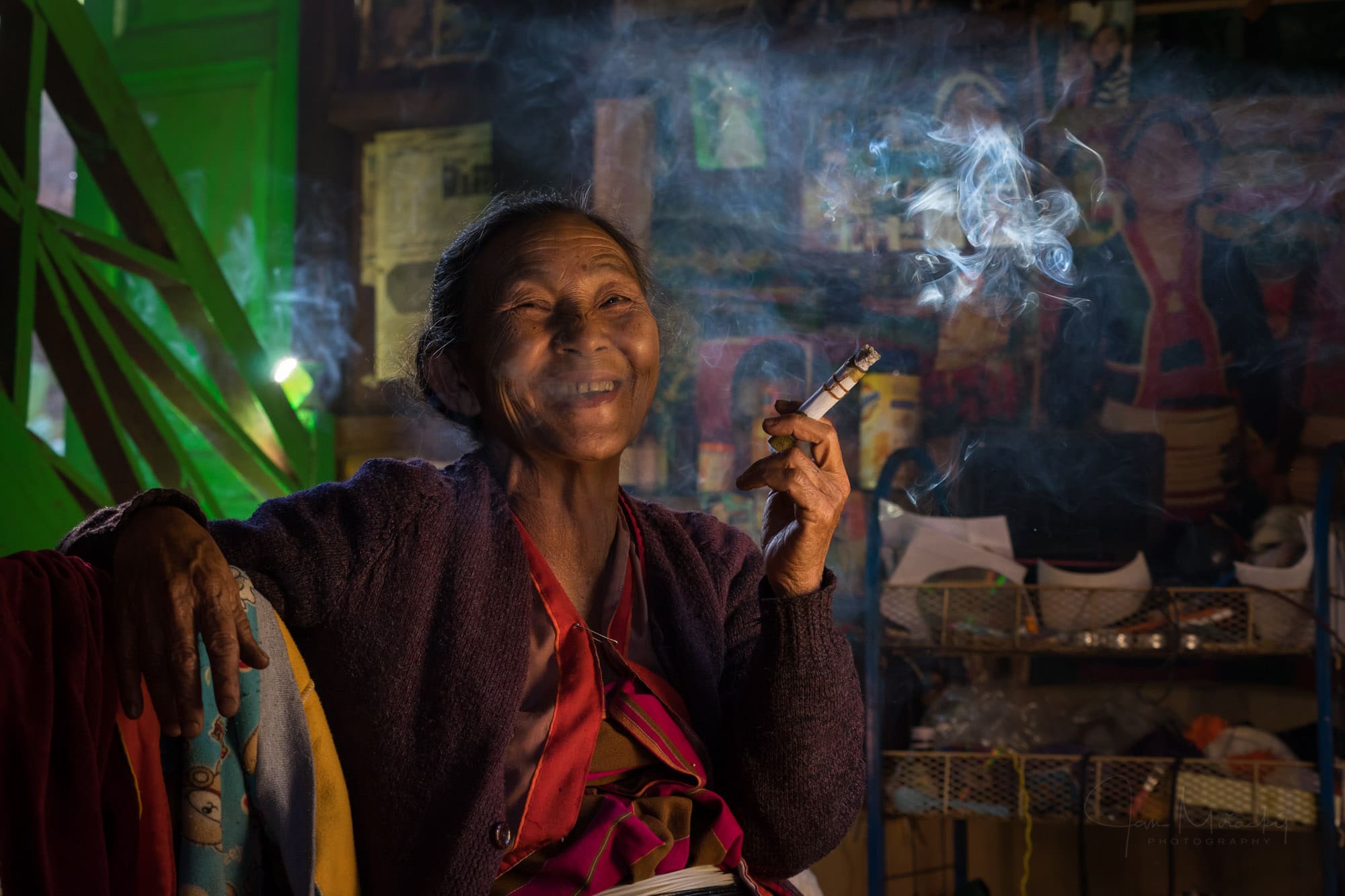 Old Shan woman smoking cigar