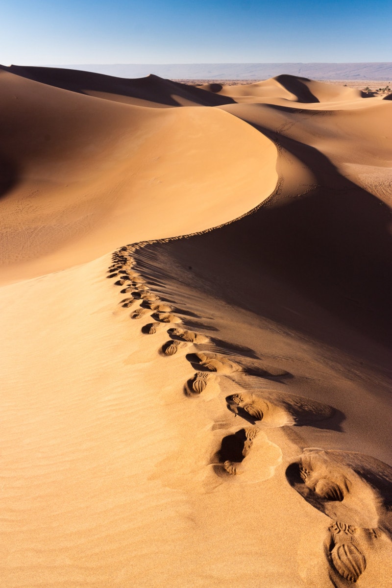 Footprints on sand dunes of Erg Chigaga