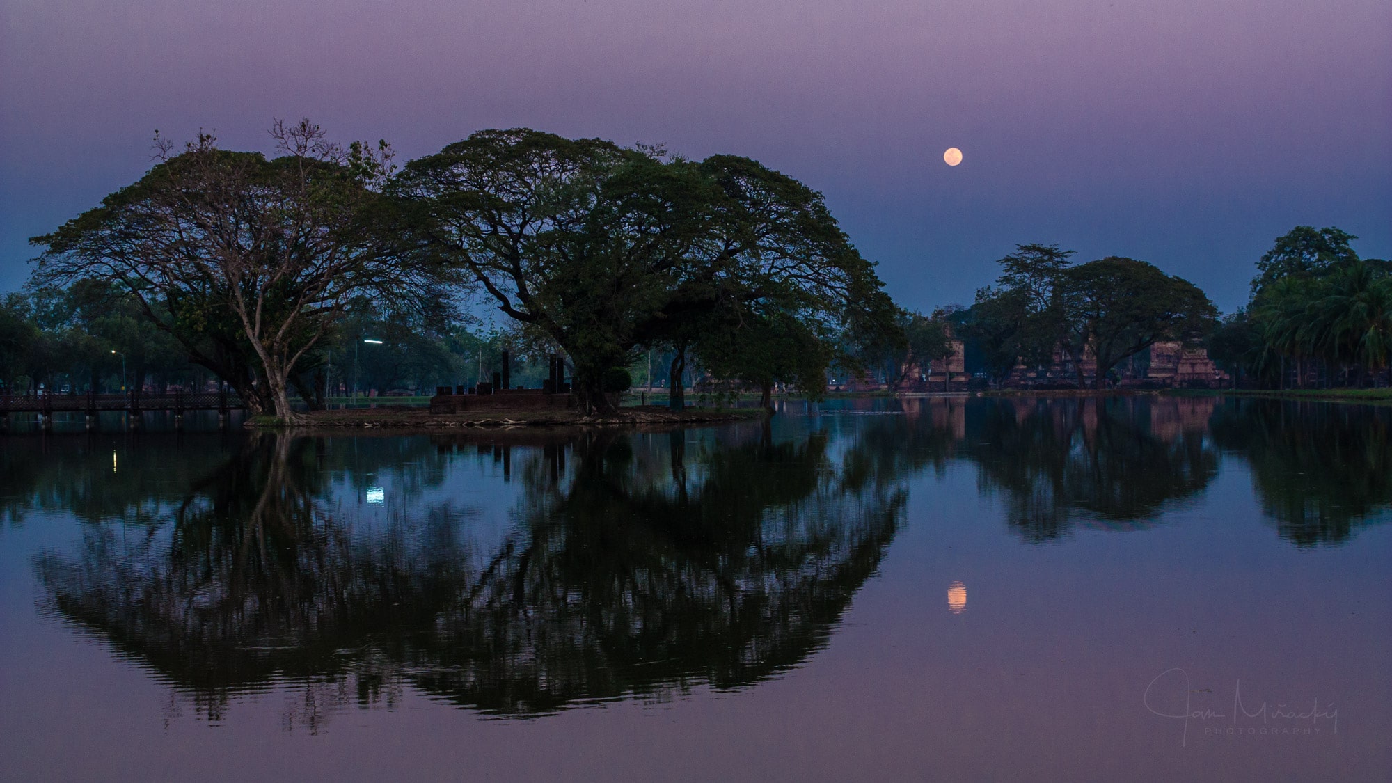 Moon rising above Sukhothai temples