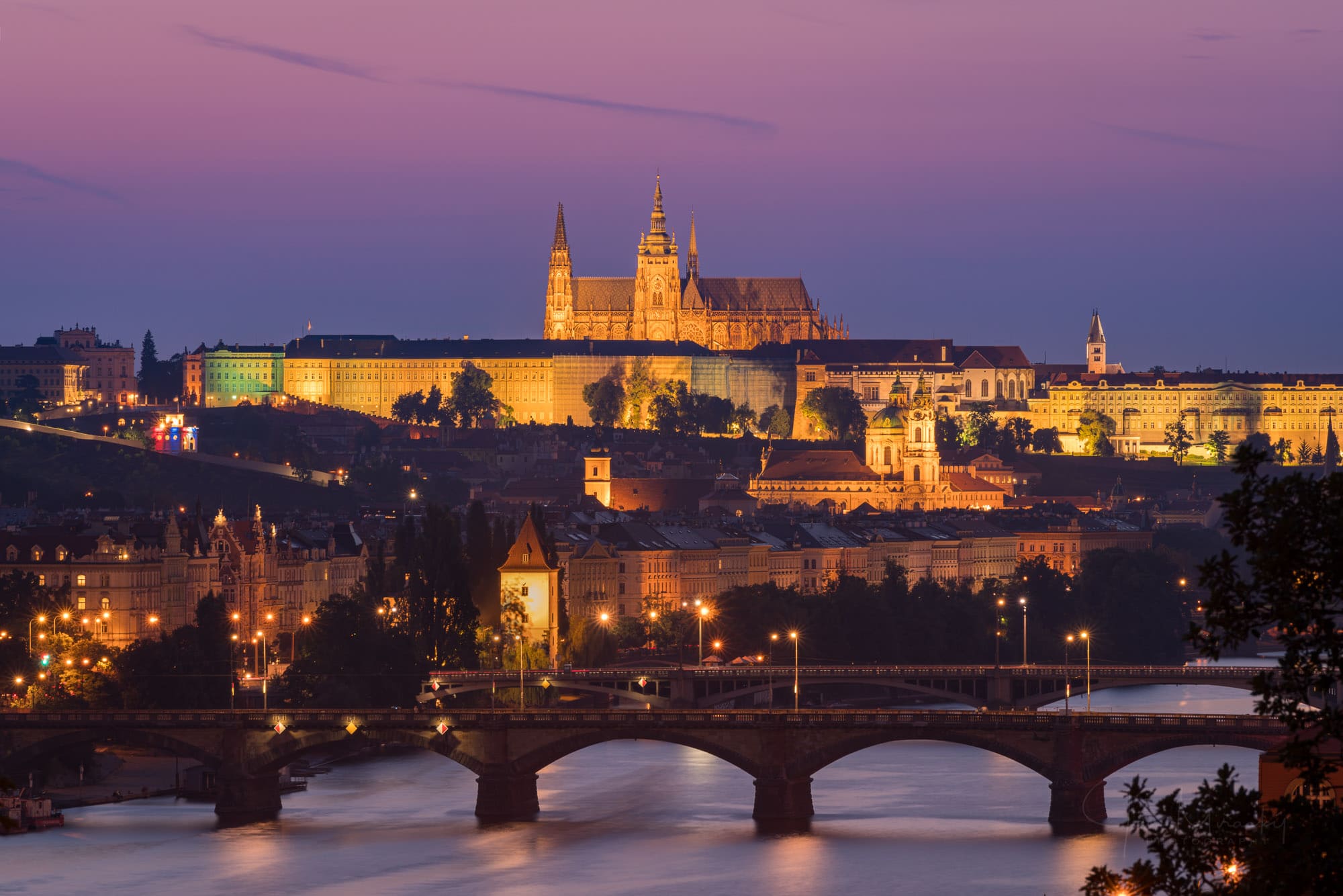 Prague castle and Vltava river at sunset