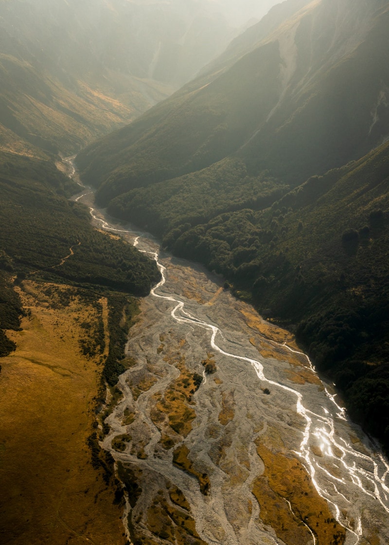 River flowing through a valley in Aoraki / Mount Cook National Park
